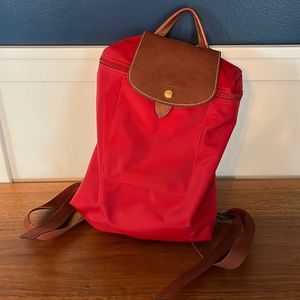 Longchamp Le Pliage Nylon Backpack- deep red fabric. Medium brown leather.